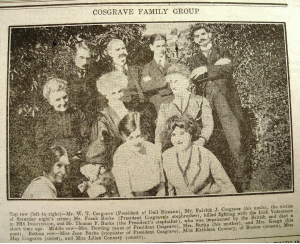An old black and white photo of the Cosgrave Family Group. The newspaper caption says, 'Top row (left to right) - Mr. W. T. Cosgrave (President of Dail Eireann), Mr. Patrick J. Cosgrave (his uncle), the victim of Saturday night's crime; Mr. Frank Burke (President Cosgrave's stepbrother), killed fighting with the Irish Volunteers in 1916 Insurrection, and Mr. Thomas F. Burke (the President;s stepfather), who was imprisoned by the British and died a short time ago. Middle row - Mrs. Dowling (aunt of President Cosgrave), Mrs. Burke (his mother), and Mrs. Keogh (his aunt). Bottom row - Miss Joan Burke (stepsister of President Cosgrave), Miss Kathleen Connery, of Boston (cousin), Miss May Cosgrave (sister), and Miss Lillian Connery (cousin).